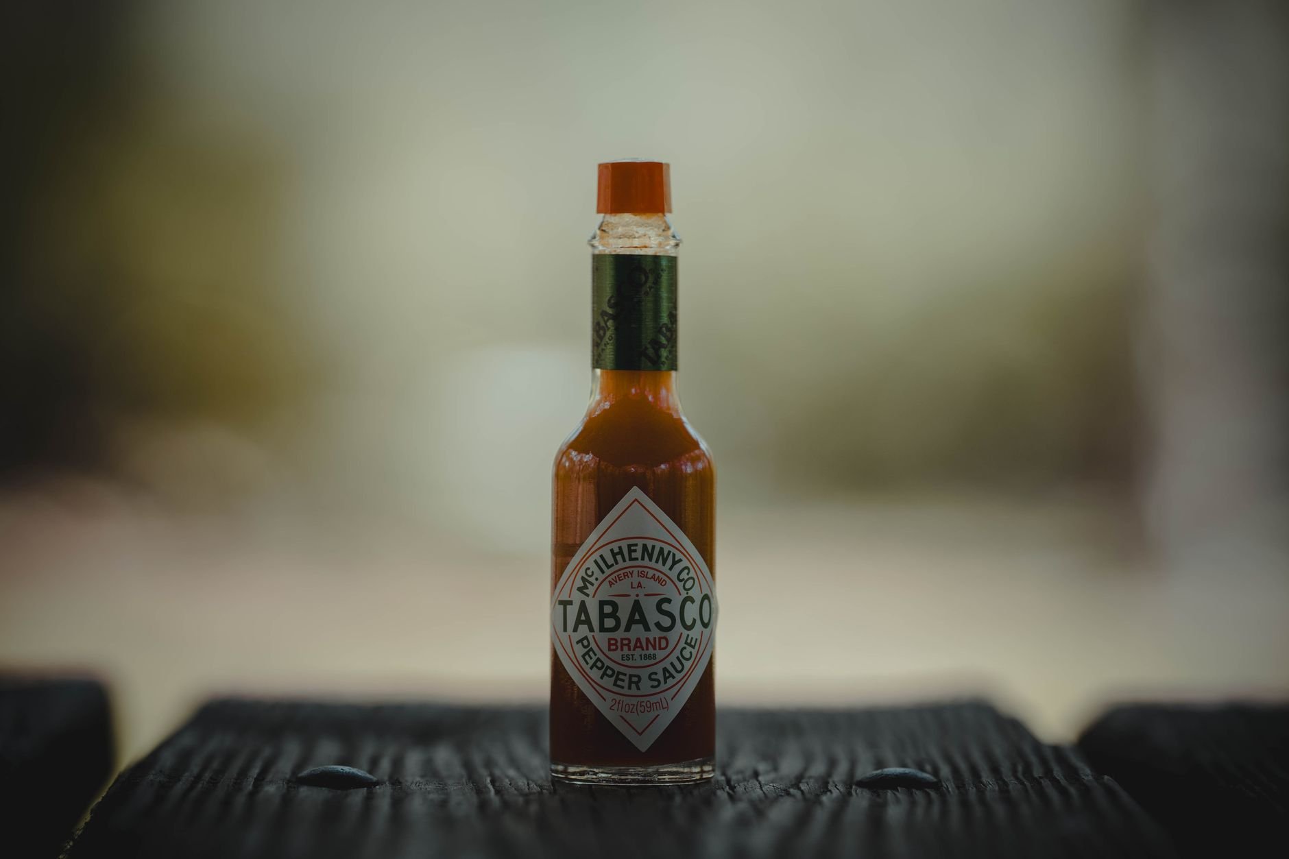 A craft hot sauce bottle, showcasing the small-batch heat inside